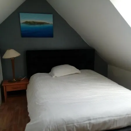 La maison du Lenn face à la mer Louannec Chambre photo